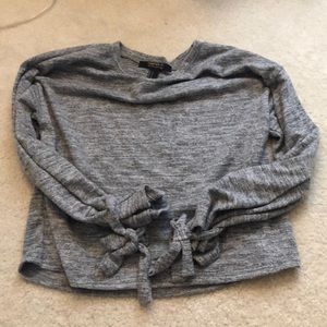 Sweater with tie detail on the sleeves